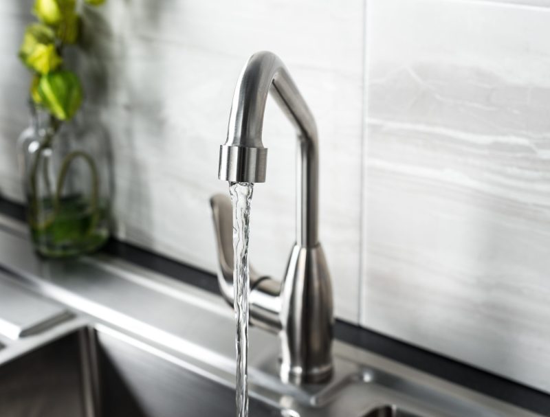 new and modern steel faucet in the kitchen scaled e1694087714447